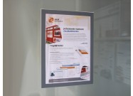 Selfadhesive magnetic foil A3 on a wall of glass